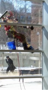 Window cleaners dressed up as superheroes for the children's hospital